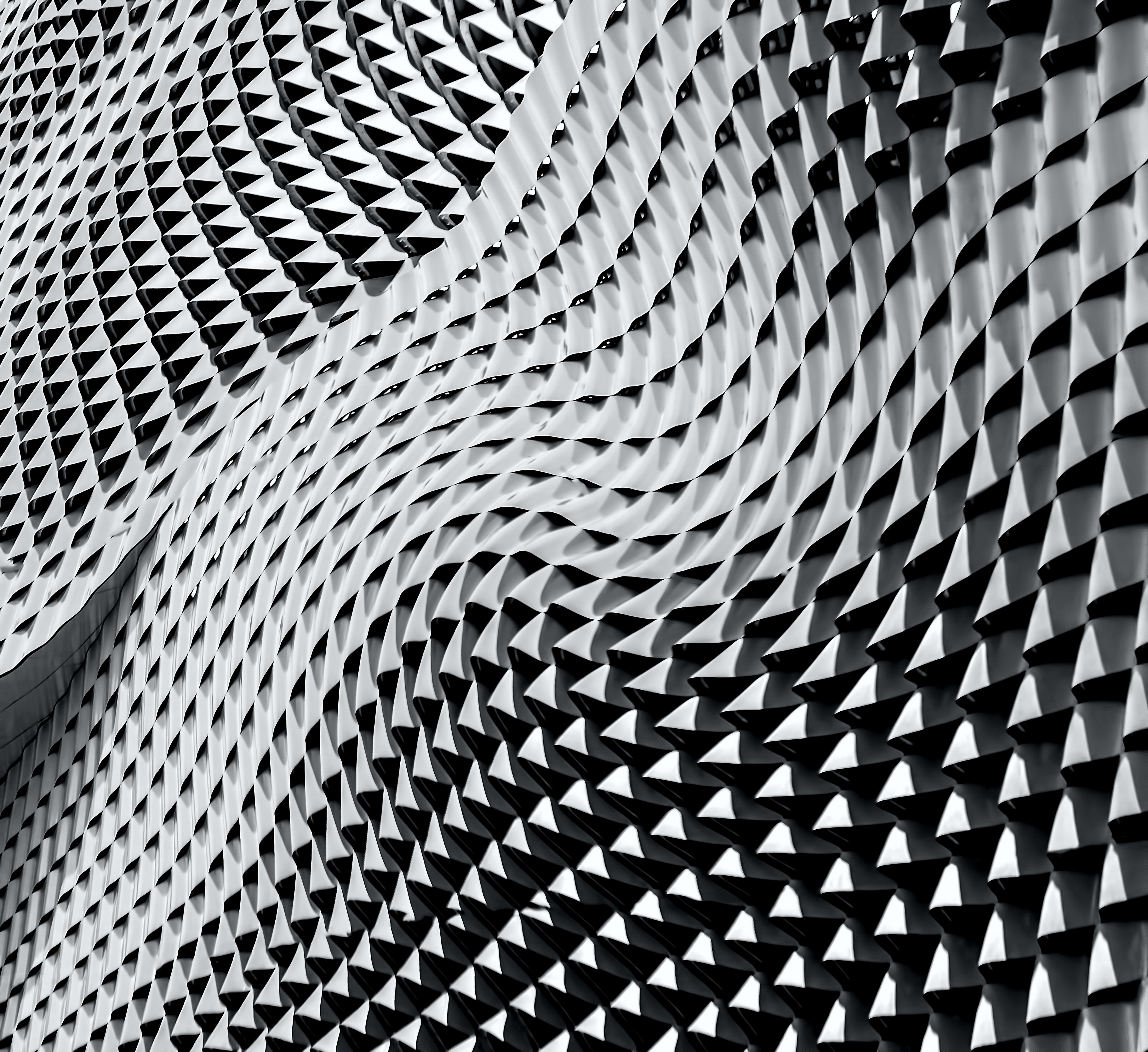 A captivating black and white facade pattern that reflects Caldera Capital's focus on creating detailed and structured financial solutions for clients