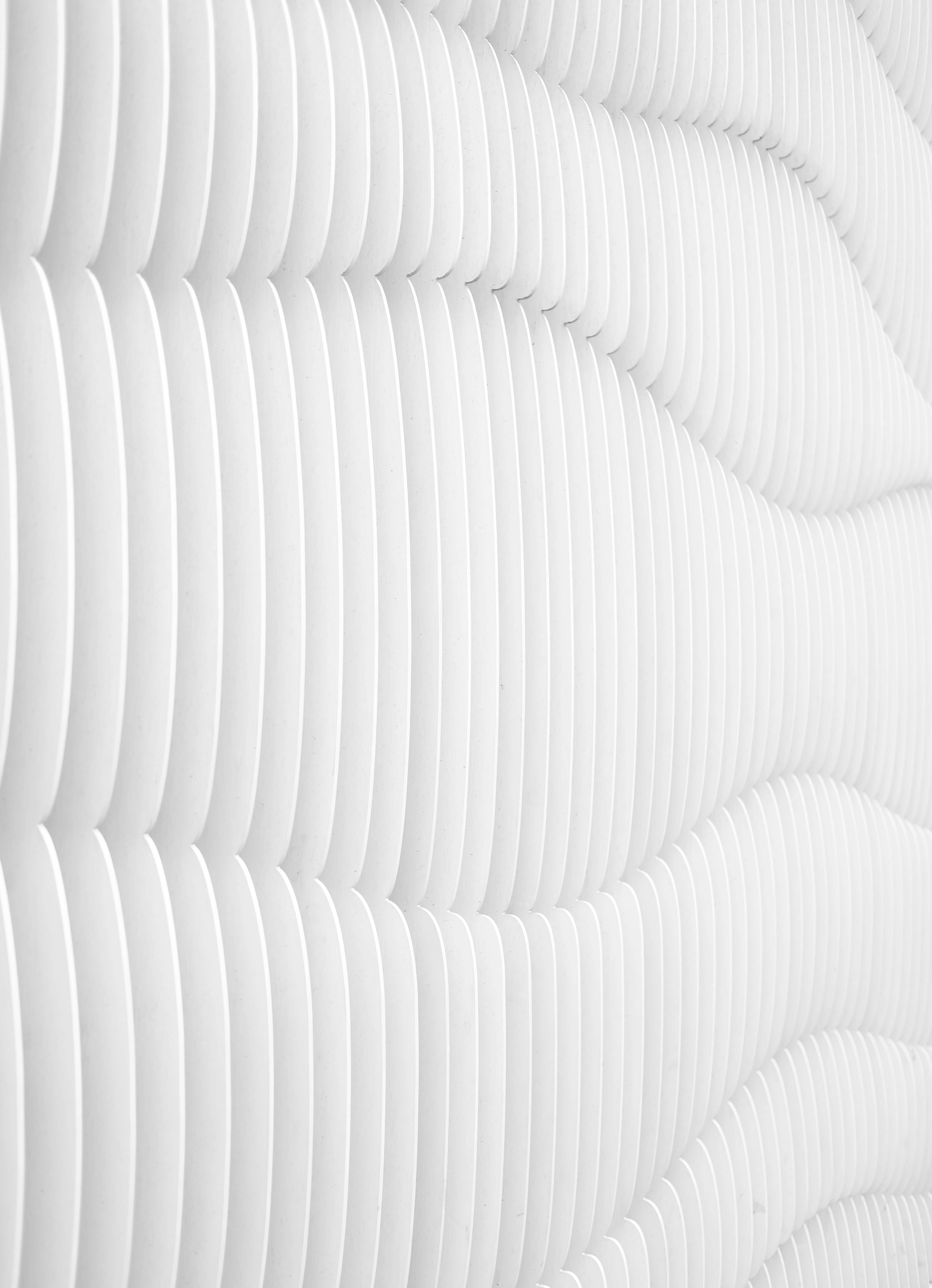 Crisp white ridges in an abstract design, mirroring the clarity and precision Caldera Capital offers in corporate financial advising and management consulting